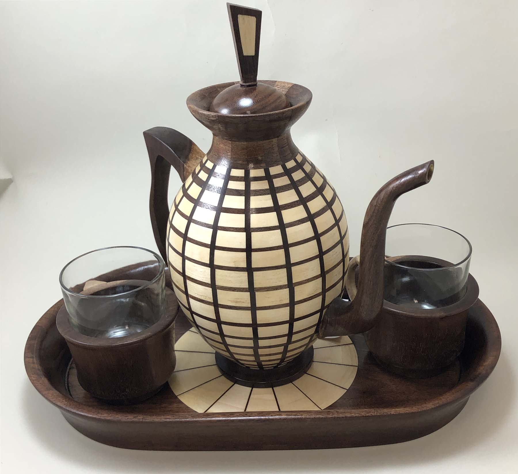 Segmented tea service with matching tray and cups from Chicago Woodturners member work